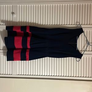 Sleeveless navy and pink mini dress with pockets